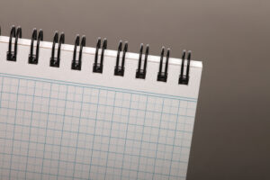 open notebook with grid pages